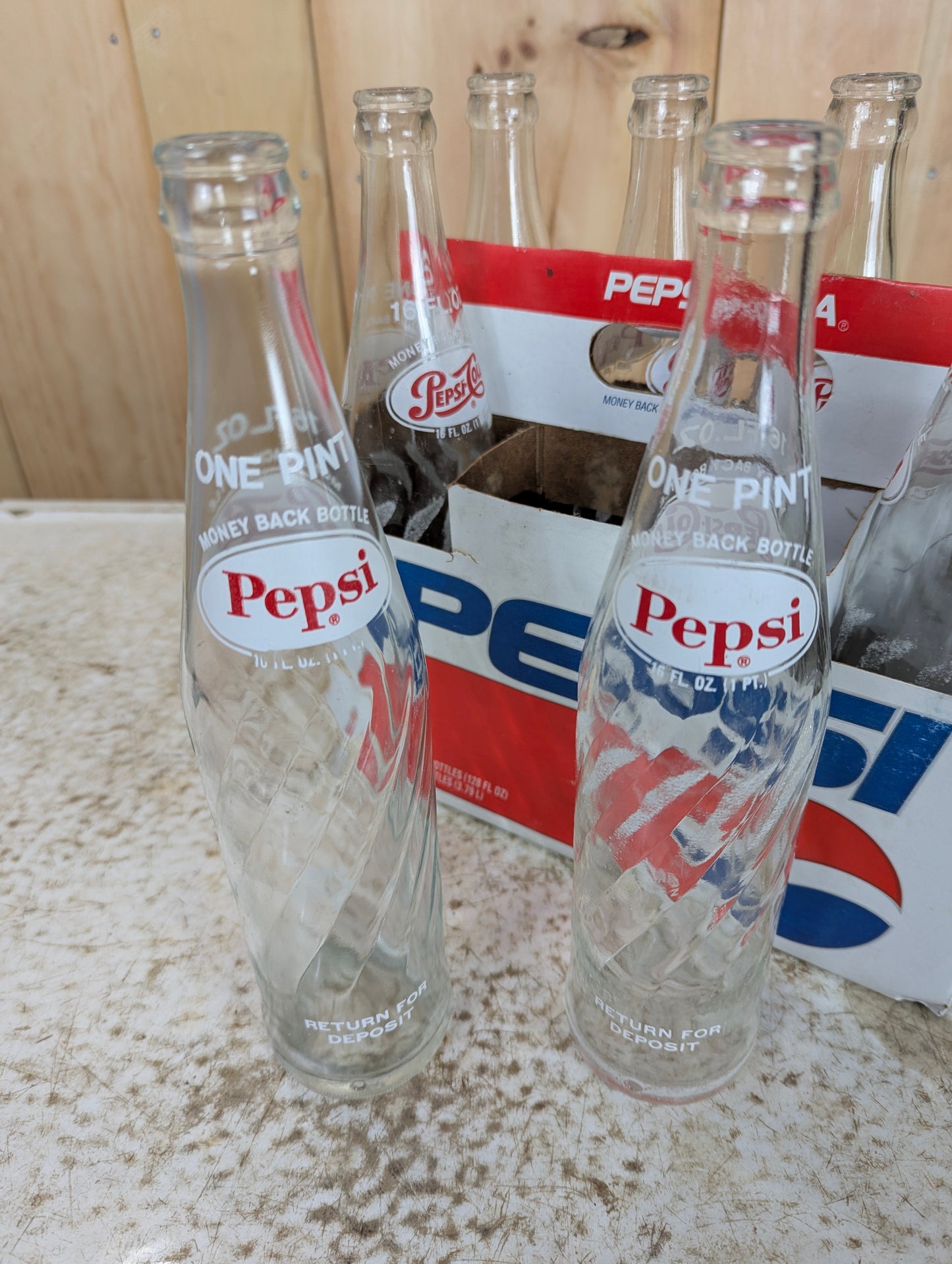 1970’s Pepsi 16 Oz. Swirl Glass Bottles in Cardboard 8 Pk. Case