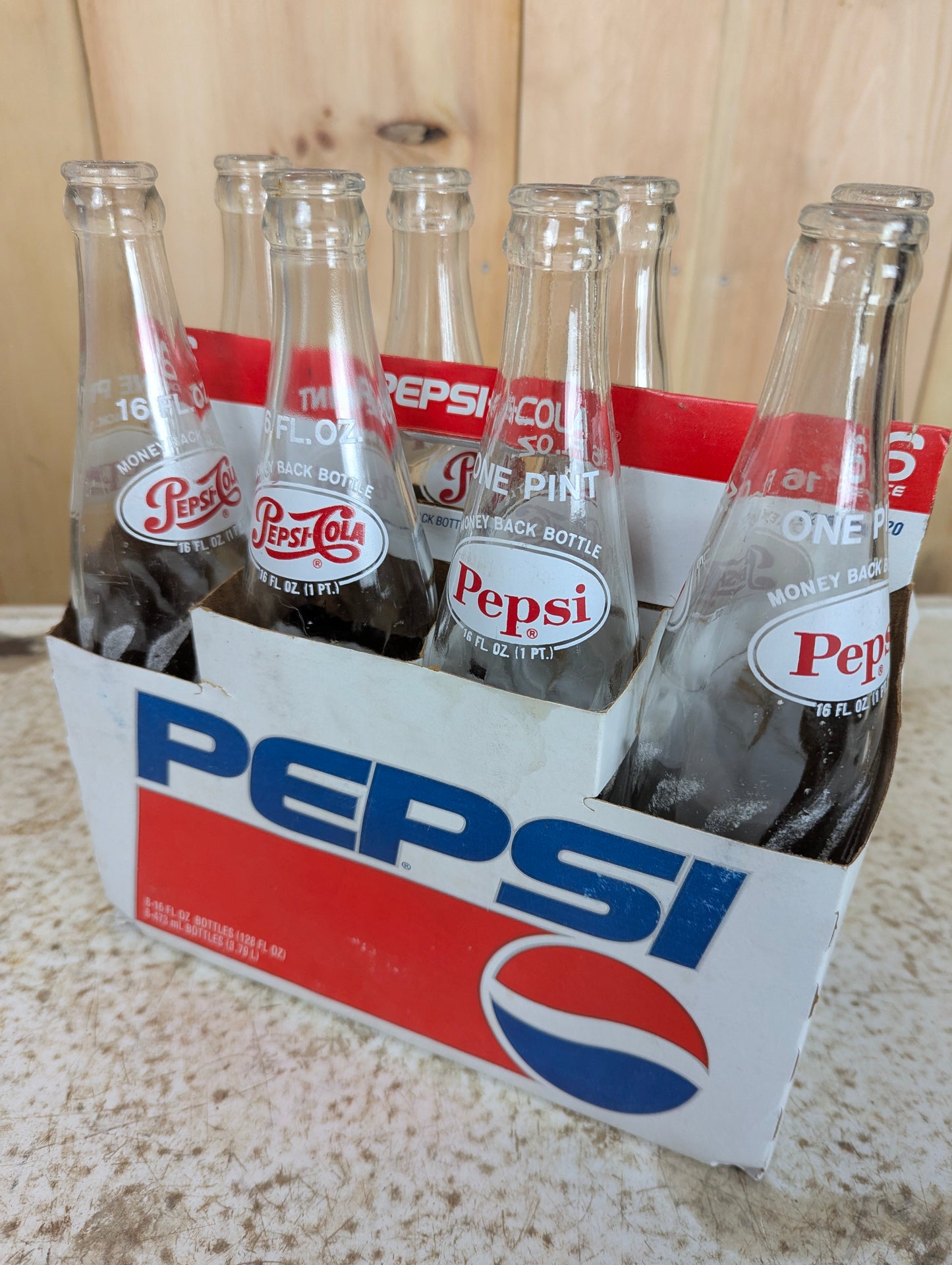 1970’s Pepsi 16 Oz. Swirl Glass Bottles in Cardboard 8 Pk. Case