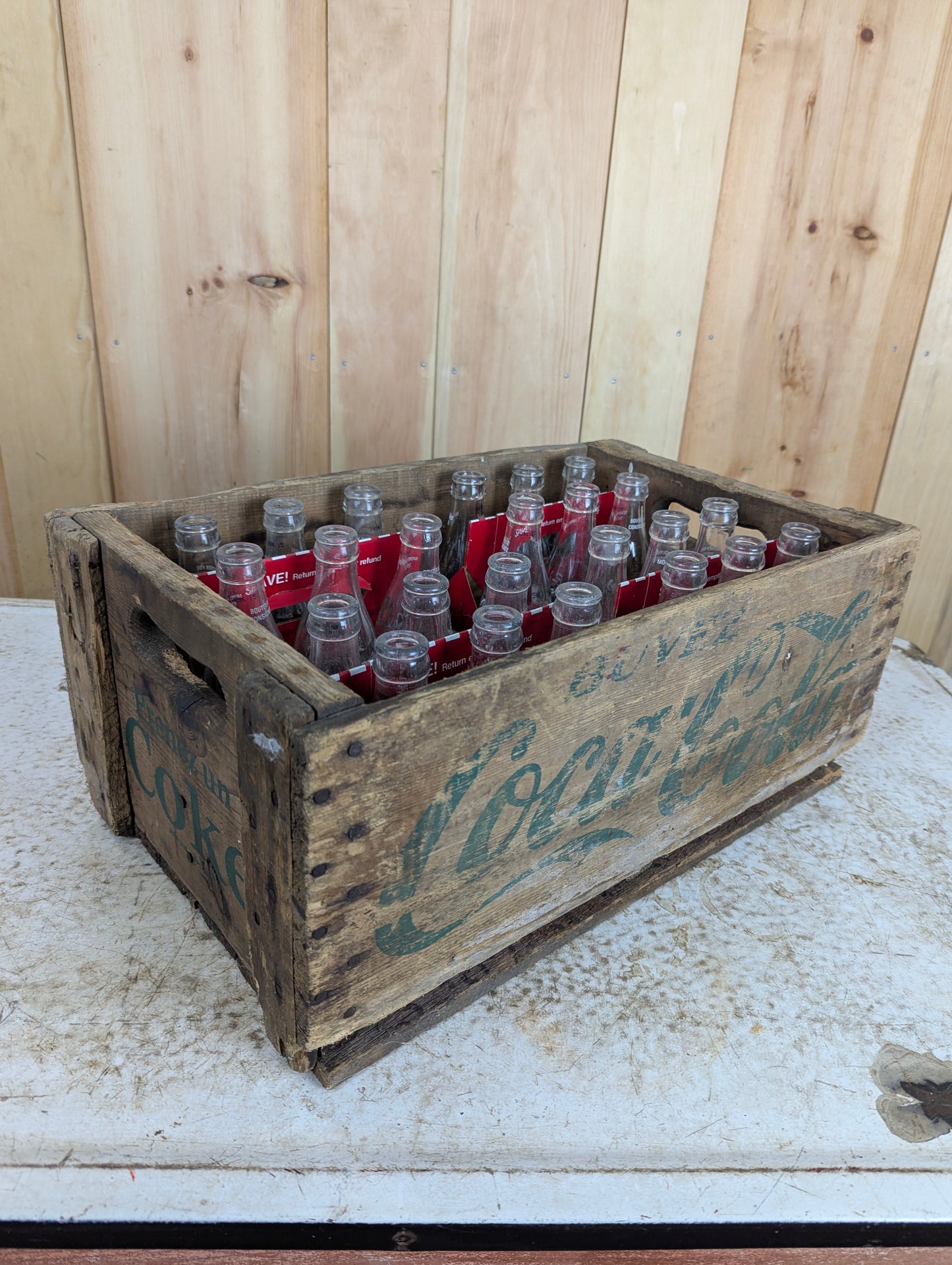 Wooden Coke Crate with 24 Empty Coca Cola Bottles in Cases