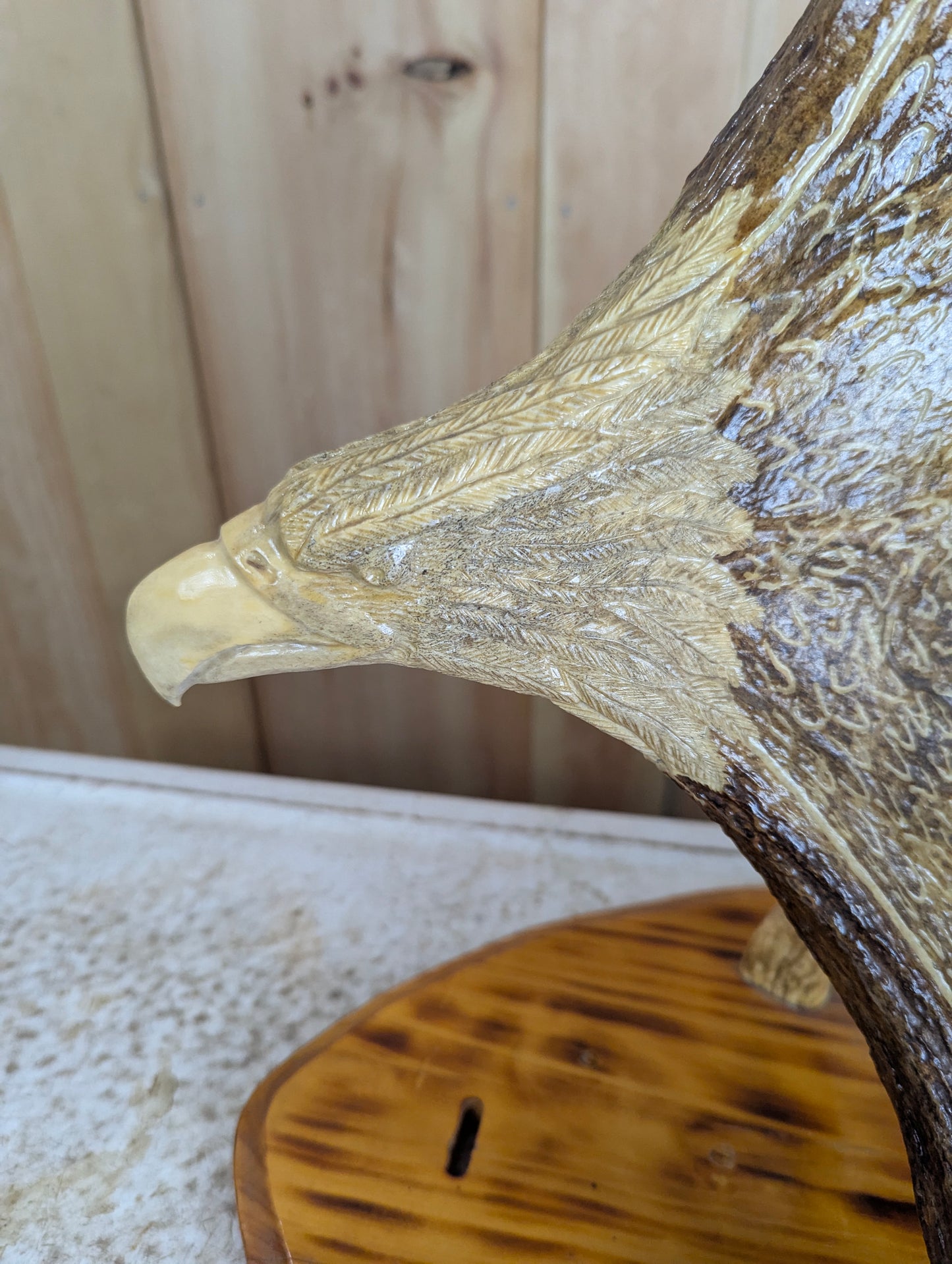Handcrafted Moose Antler Carving Eagle Sculpture mounted on Wooden Base