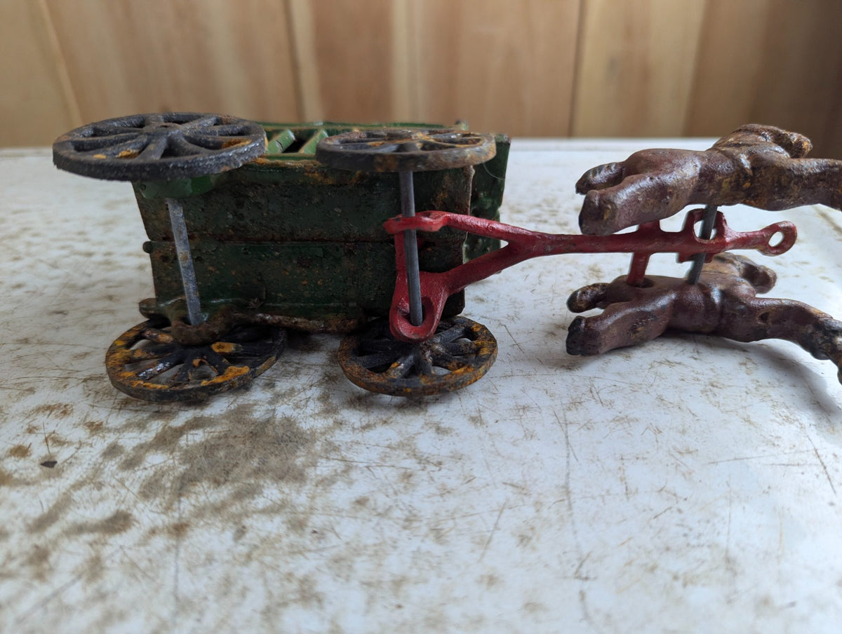 Vintage Cast Iron Horse-Drawn Carriage Toy with Green Canopy Coach