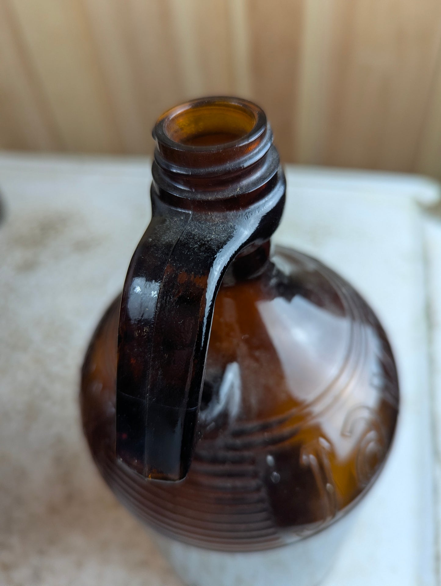 Vintage 64oz Half-Gallon Amber Glass Javex Bottle with Finger Loop - view 5