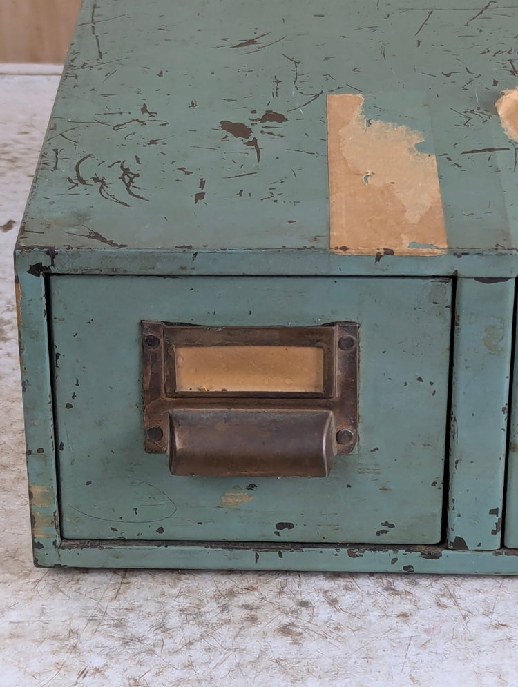 Vintage industrial decor collection featuring factory carts, metal storage, industrial lighting, and antique utility pieces at KG Novelties