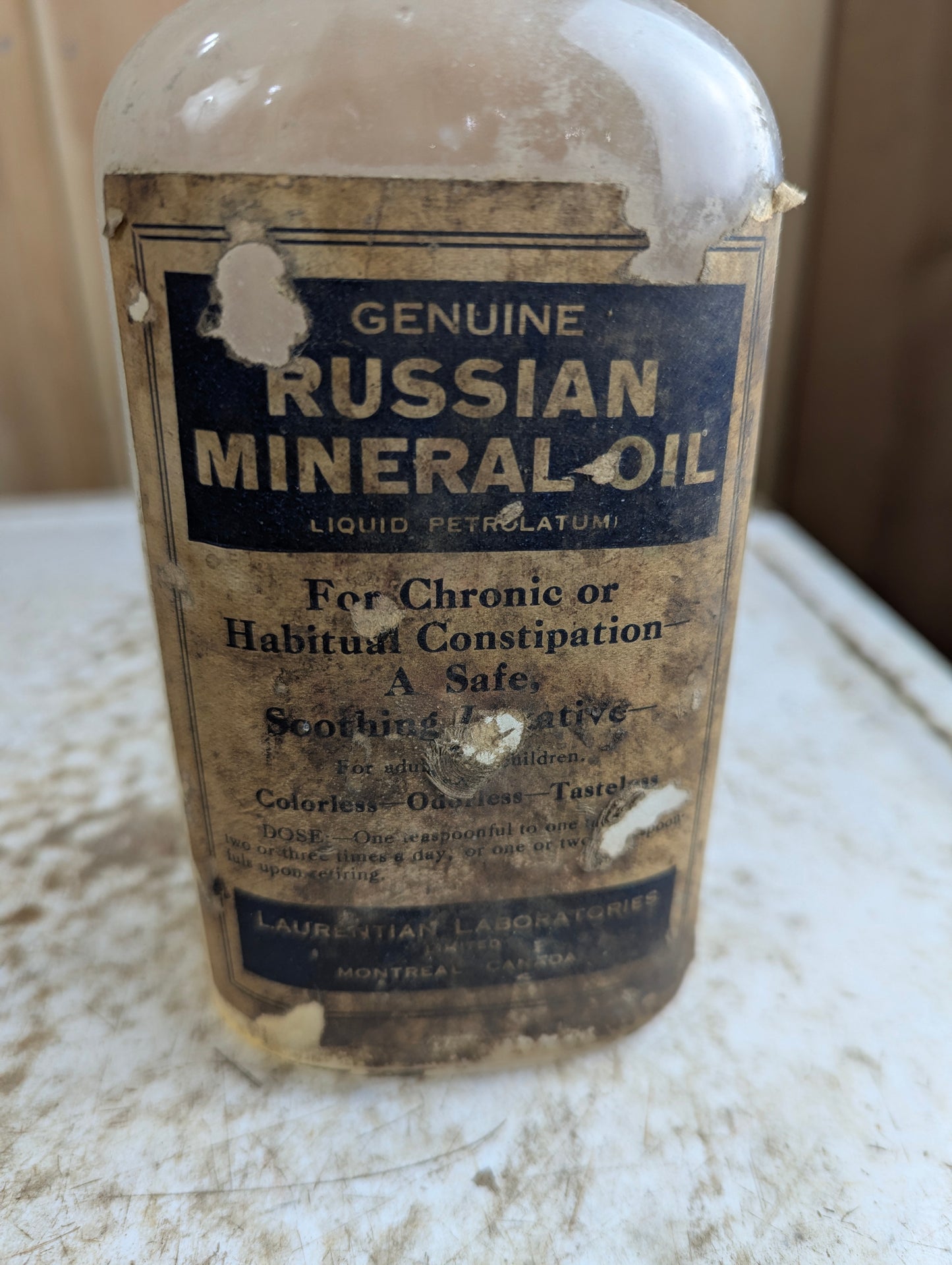 1930s Russian Mineral Oil Laurentian Laboratories Medicine Bottle with Label and cap