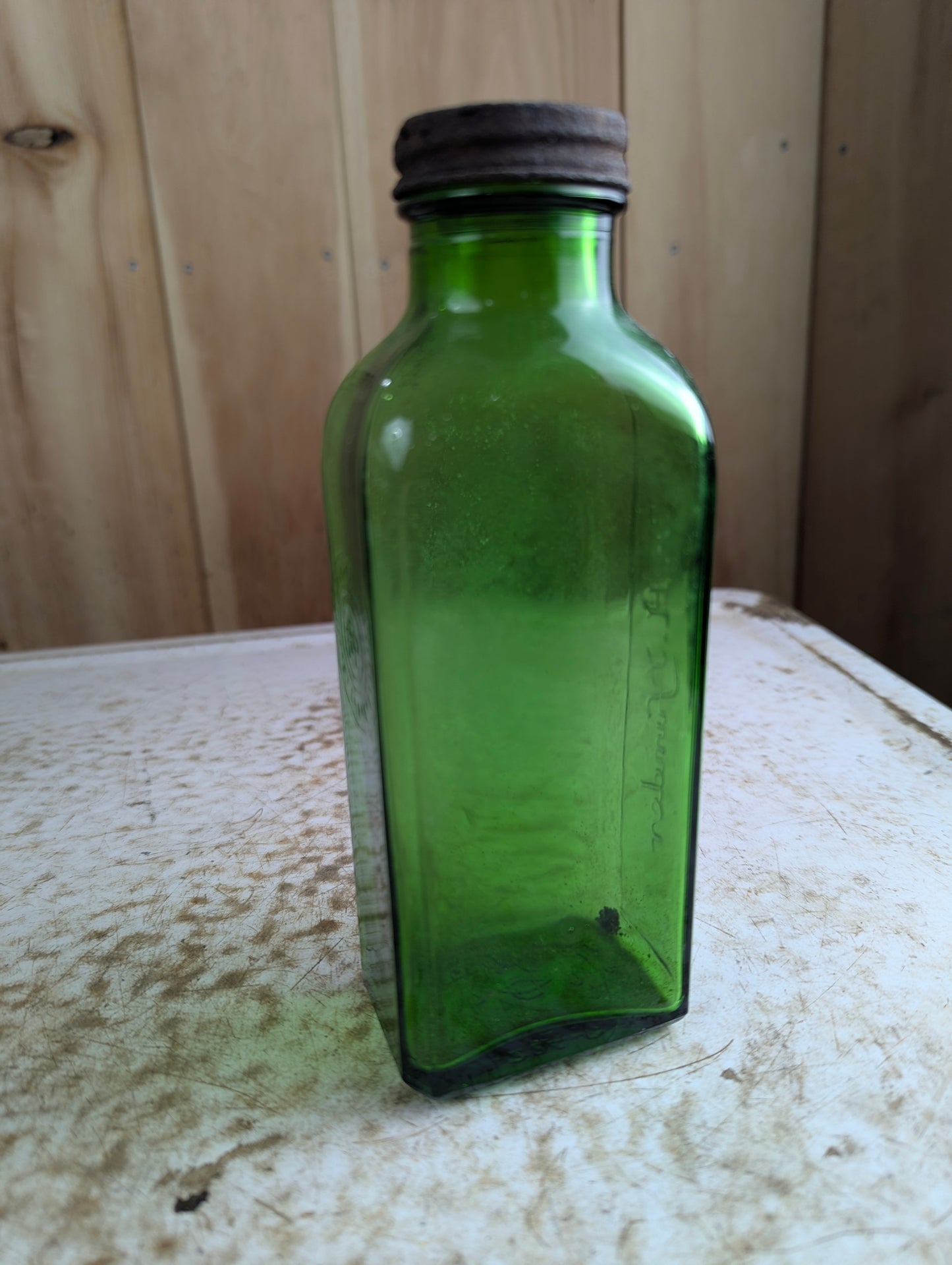 Vintage F.H. Pfunder Green Glass Medicine Bottle with Cap