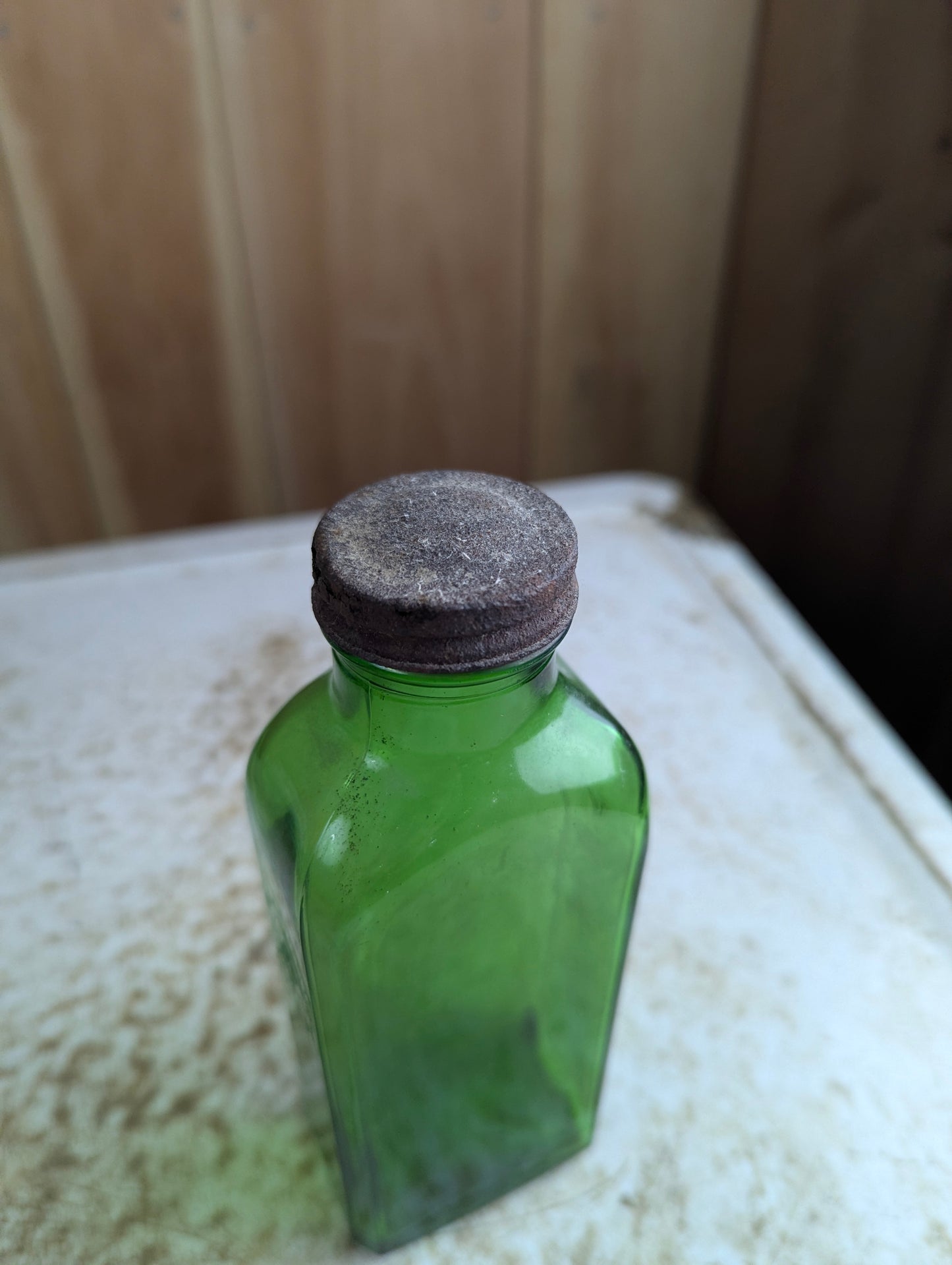 Vintage F.H. Pfunder Green Glass Medicine Bottle with Cap
