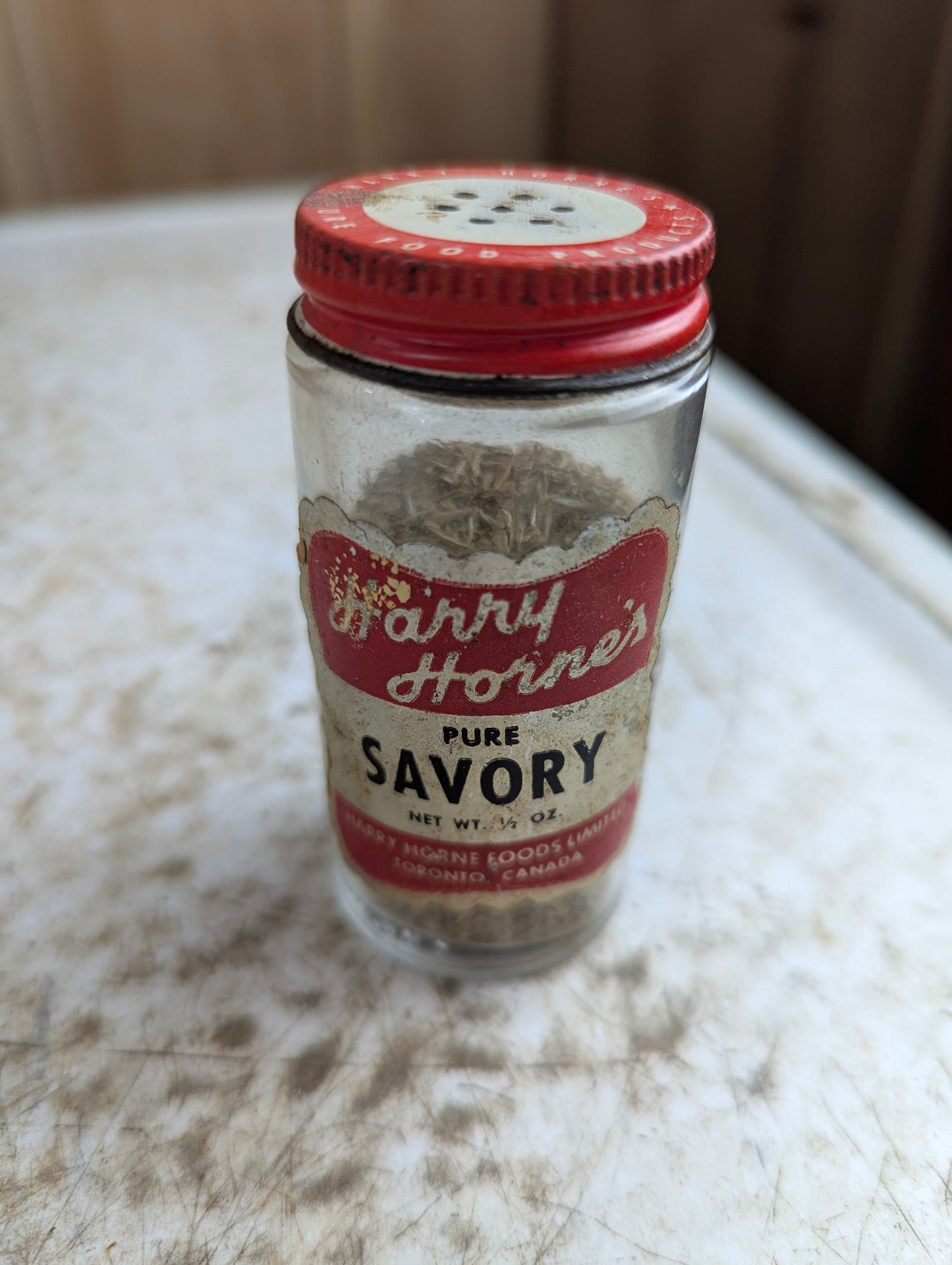 Harry Horne's 1/2oz Savory Bottle Partly Filled with Original Label and Lid