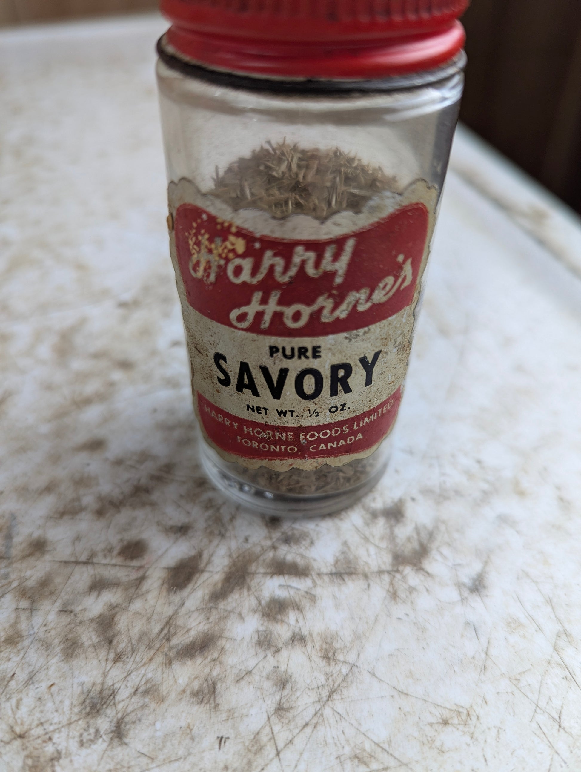 Harry Horne's 1/2oz Savory Bottle Partly Filled with Original Label and Lid