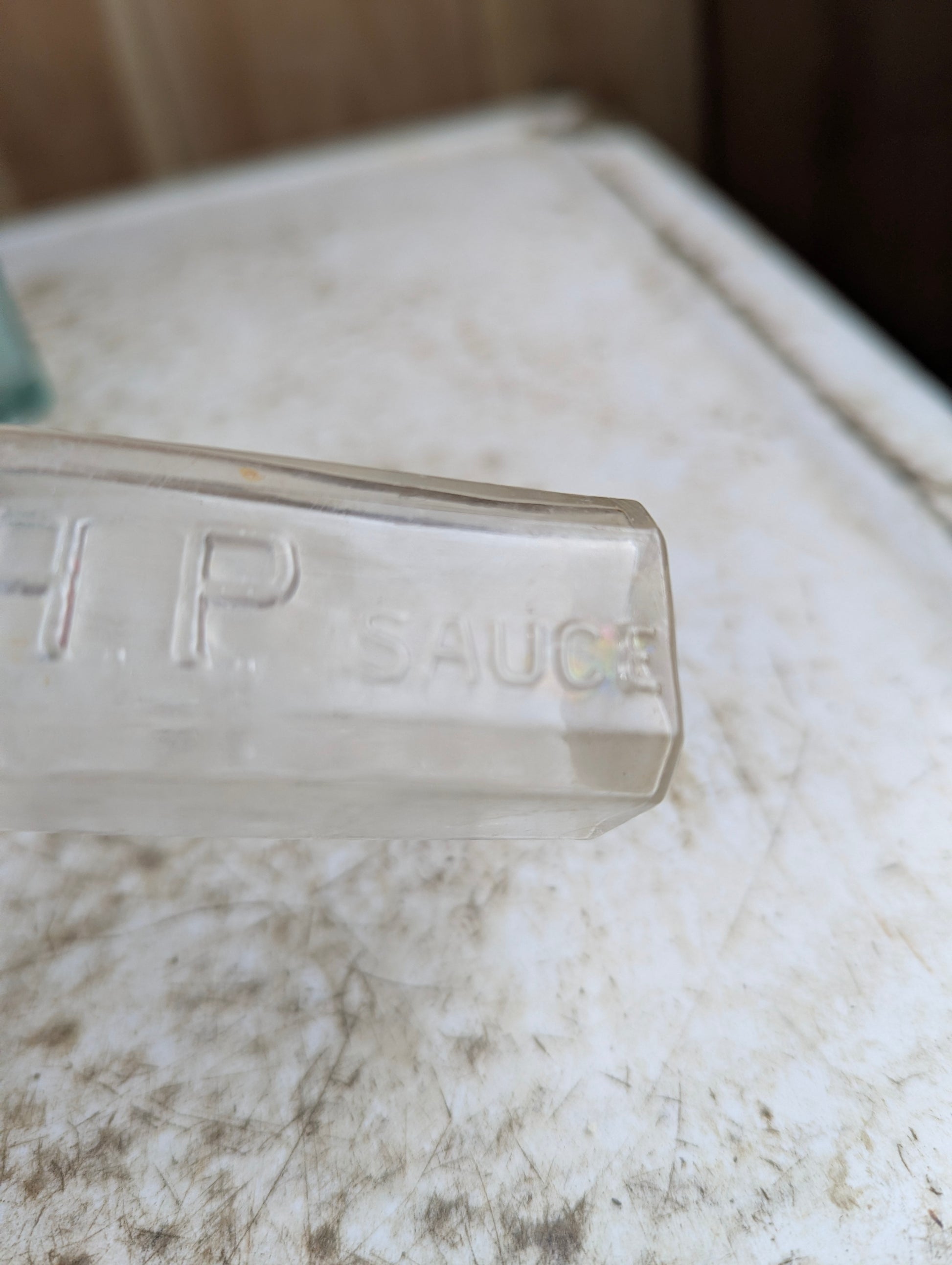 Small Antique H.P. Sauce Embossed Glass Sample Bottle