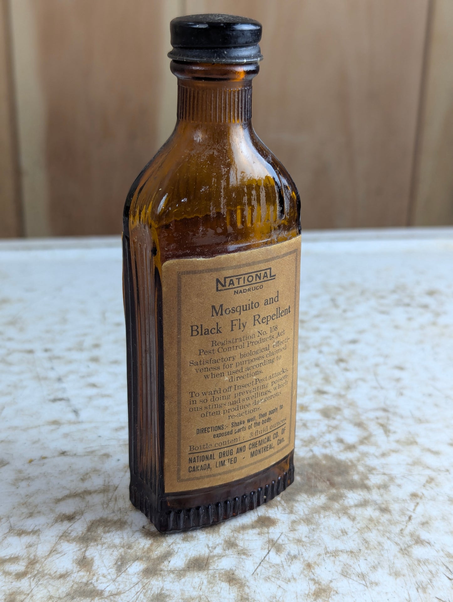 Vintage National Druco Mosquito and Black Fly Repellent Amber Glass Bottle with Label and Cap