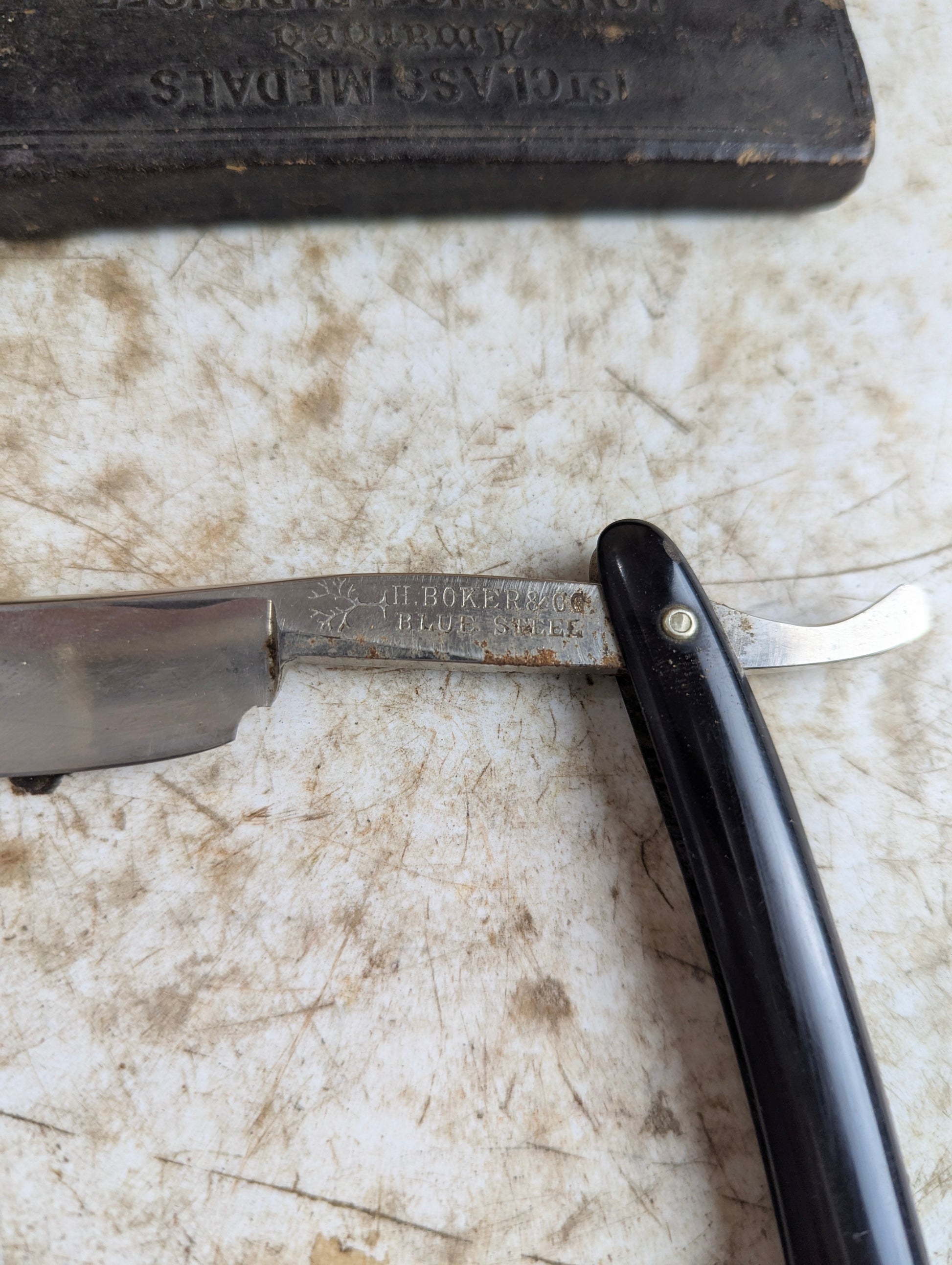 Vintage H. Boker & Co. Blue Steel Straight Razor with Black Handle