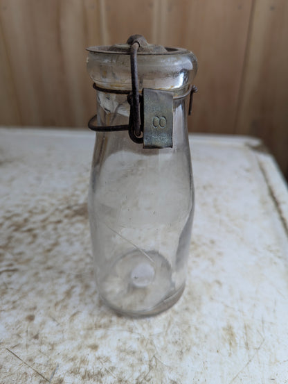 1910s Half Pint Manganese Glass Milk Bottle with Wire Bail Tin Lid