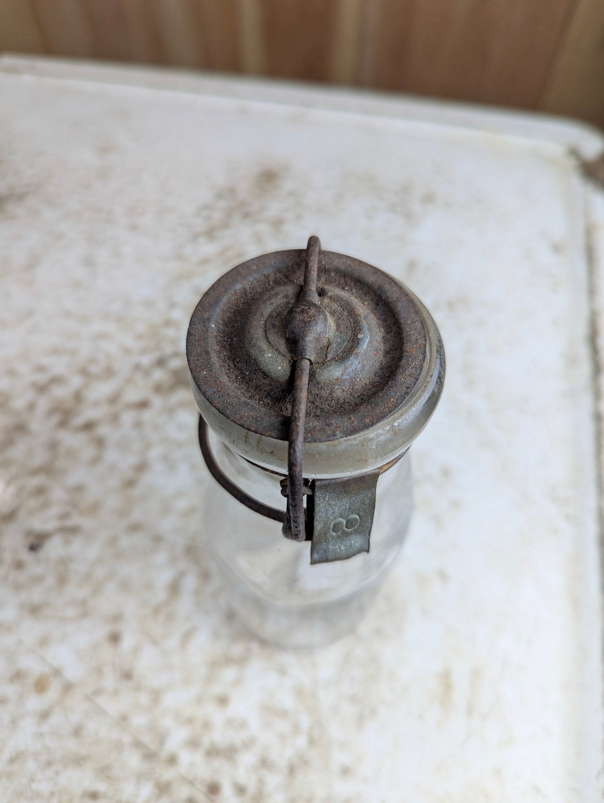 1910s Half Pint Manganese Glass Milk Bottle with Wire Bail Tin Lid