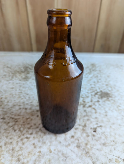 1940 O'Keefe's Amber Glass Soda Bottle