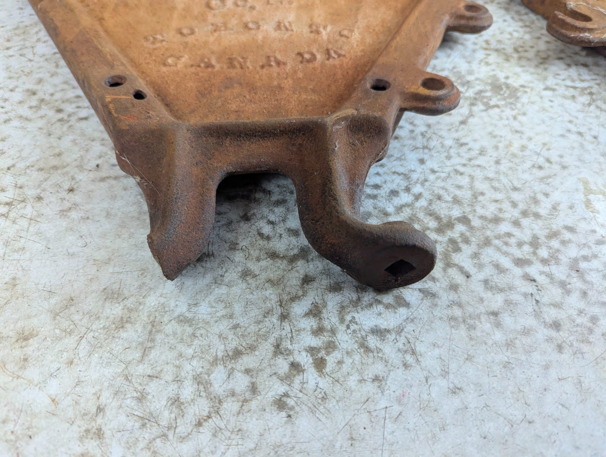 Pair of Antique Massey-Harris Cast Iron Grain Drill Ends - Damaged Foot