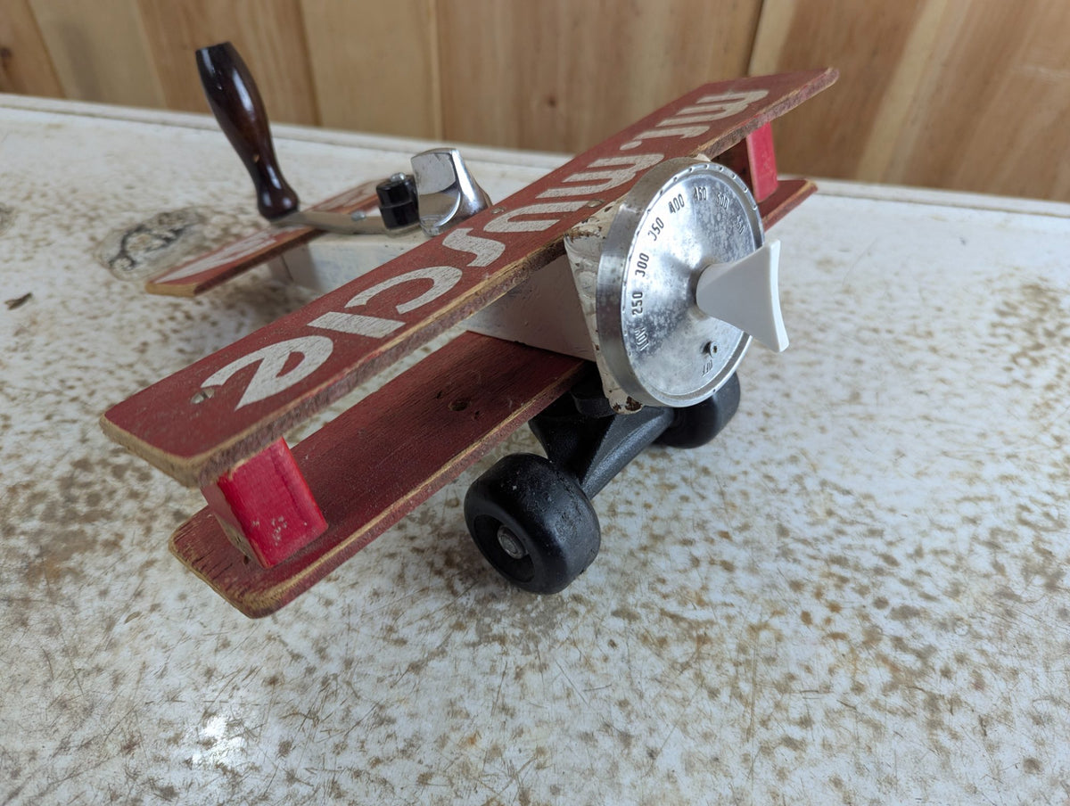 Vintage Handmade Scrap Art Wooden Biplane Toy 'Mr. Muscle' 11" long