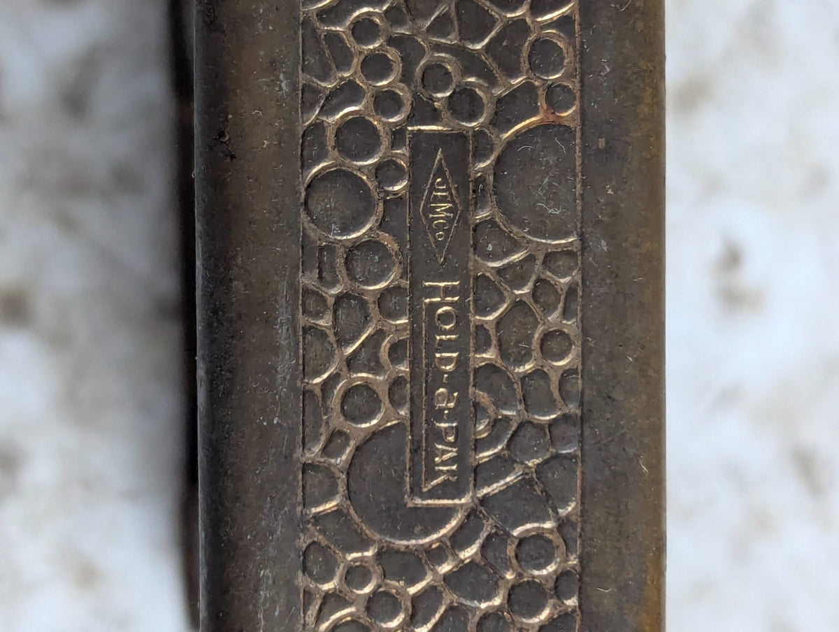 1930s Jemco Hold-a-Pak Brass Tobacco Cigarette Pack Holder