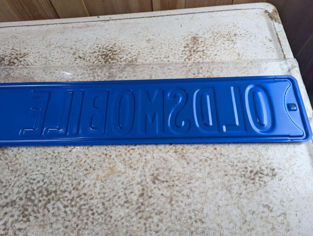 Embossed Powder-Coated Steel 'OLDSMOBILE DR' Novelty Street Sign 32" x 6"