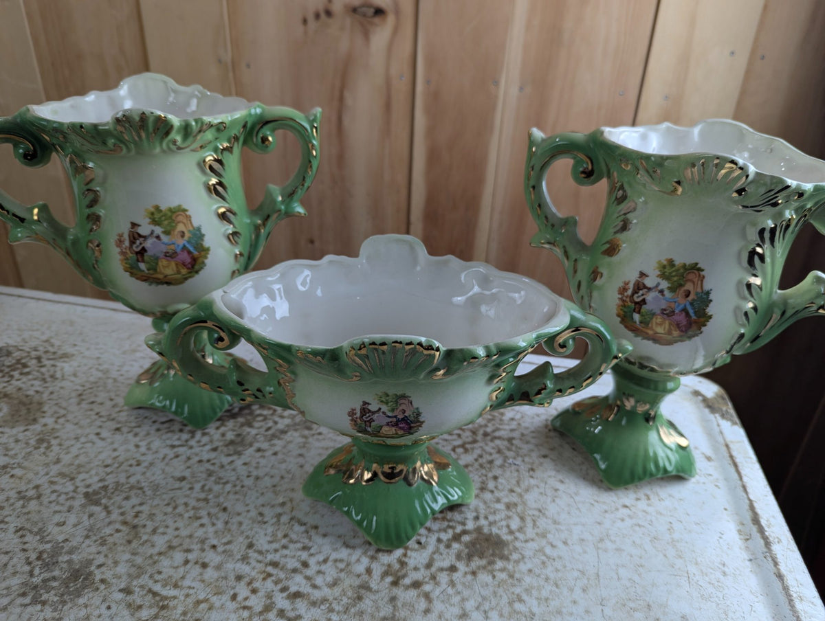 Vintage Ialtian Rococo Style Porecelian Three-Piece Mantle Garniture Set Ming Green with Gold Trim Courting Couple