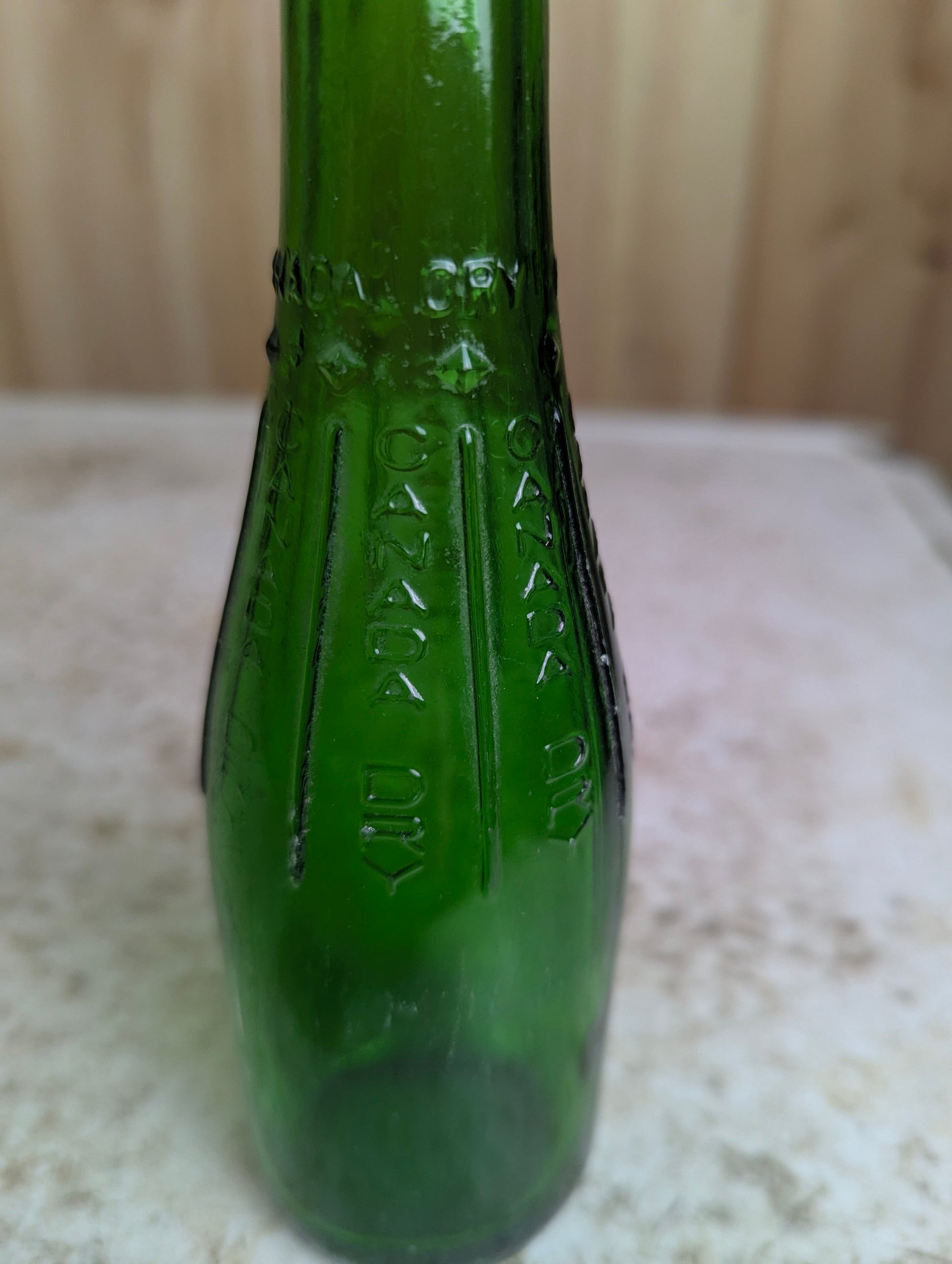 1950’s Canada Dry Ginger Ale Embossed Glass Bottle - view 2