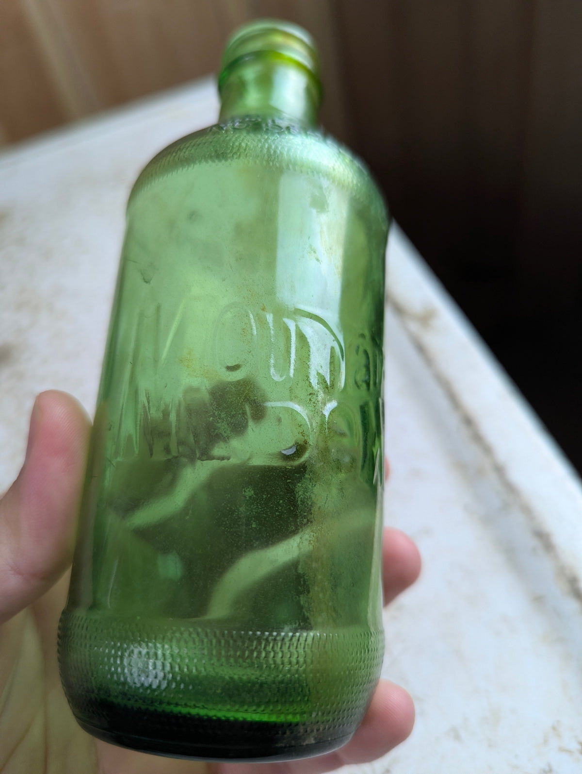 1960s Mountain Dew 10oz Stubby Embossed Green Glass Soda Bottle - view 3