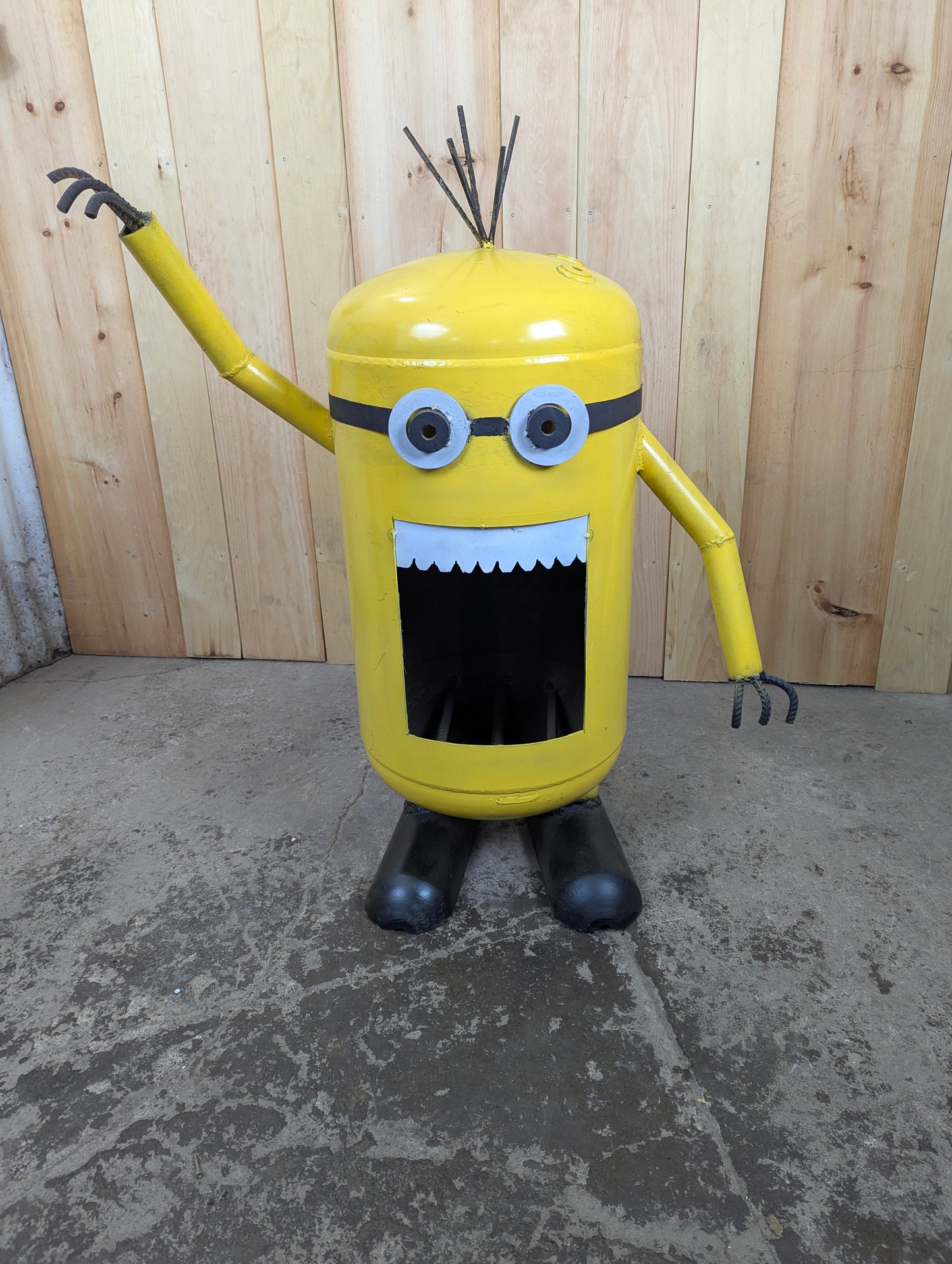 Handcrafted Minion Recycled Scrap Metal Yard Garden Art with Fire pit.