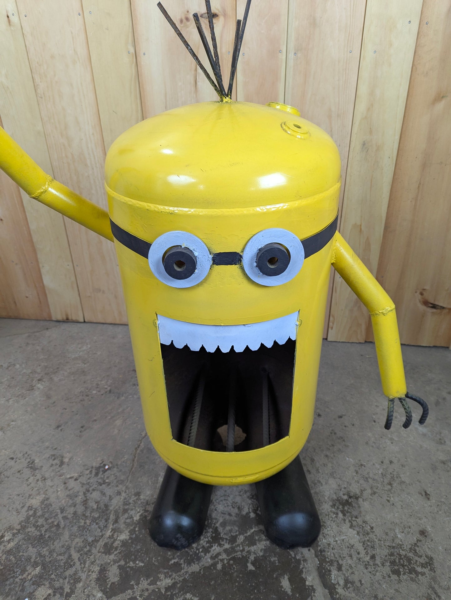 Handcrafted Minion Recycled Scrap Metal Yard Garden Art with Fire pit.