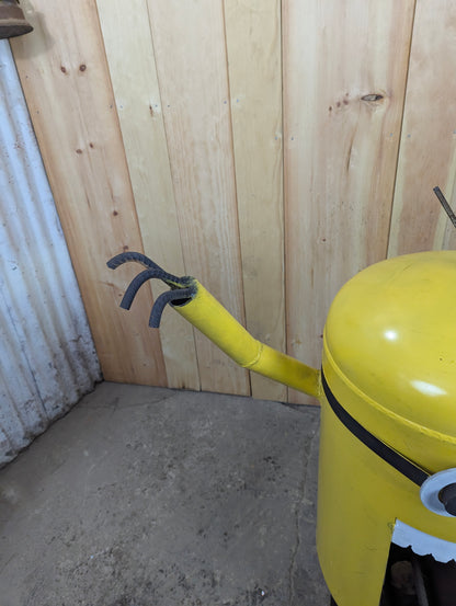 Handcrafted Minion Recycled Scrap Metal Yard Garden Art with Fire pit.