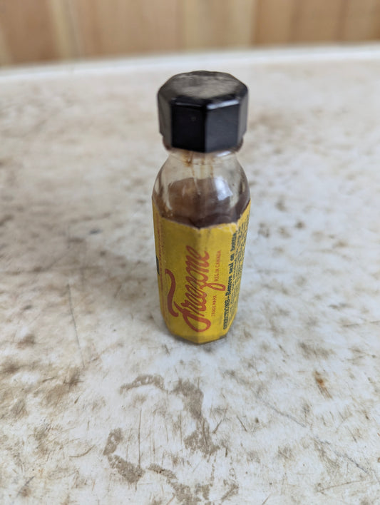 Vintage 2 1/2 Fl. Oz. Freezone Glass Bottle with Cap