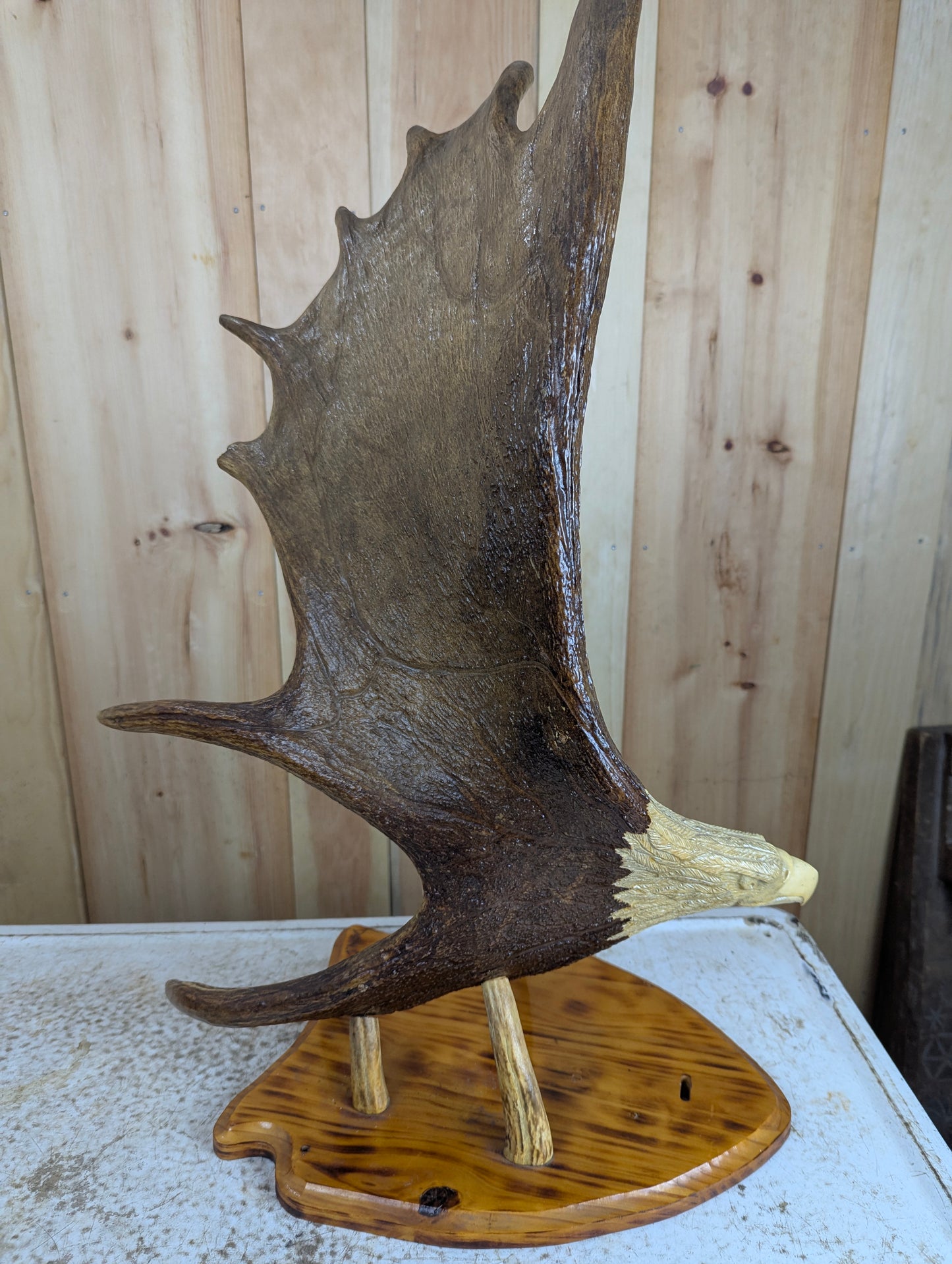 Handcrafted Moose Antler Carving Eagle Sculpture mounted on Wooden Base