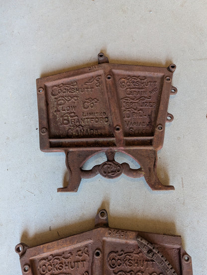 Pair of Cast Iron Cockshutt Plow Co. Branford Ont. Seeder Plates