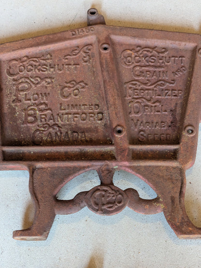 Pair of Cast Iron Cockshutt Plow Co. Branford Ont. Seeder Plates