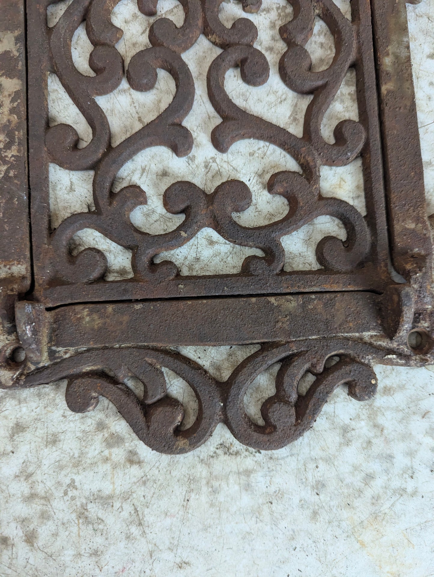 Antique Cast Iron Swing Arm Wall Trivet