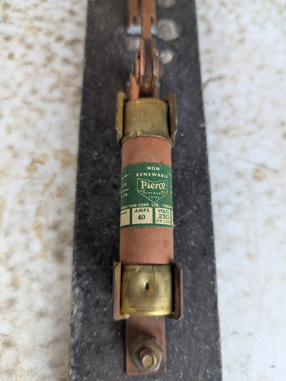 Antique Copper Knife Switch Mounted on Slate with a Fuse