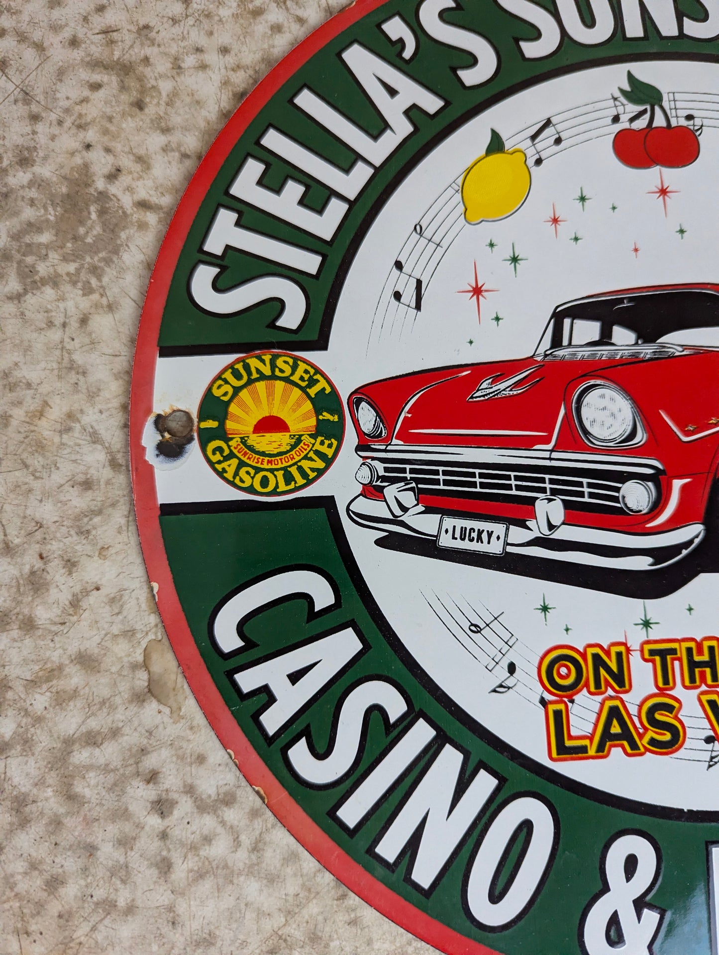 1957 Porcelain 12” Stella’s Sunset Station Gas Station Advertisement