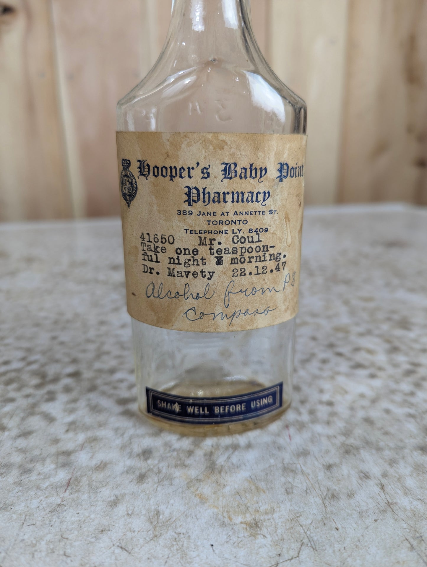 1947 Hooper's Pharmacy Medicine Bottle with Bakelite Cap