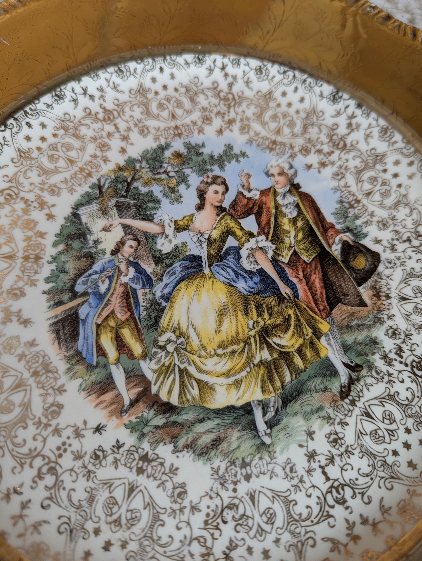 Vintage Warranted 22k gold Homer Laughlin Courting Couple Plate