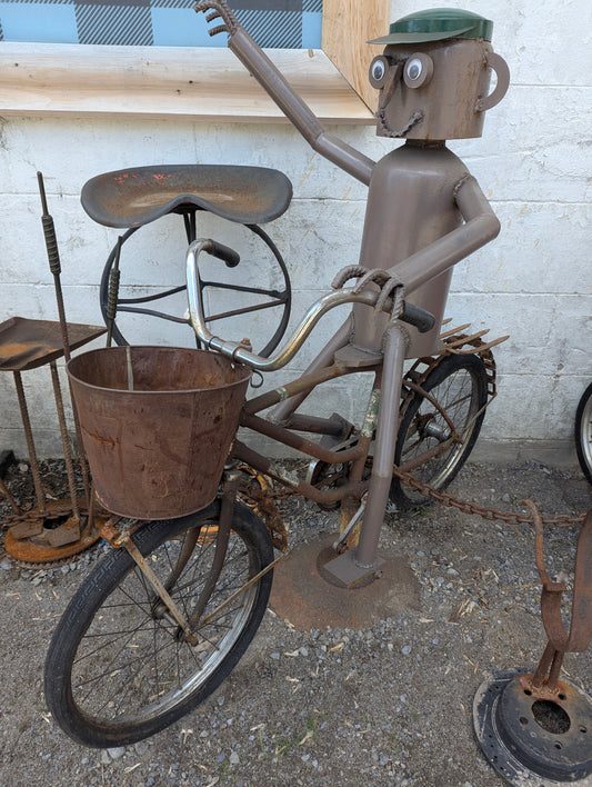 Scrap Art Man Riding Bicycle