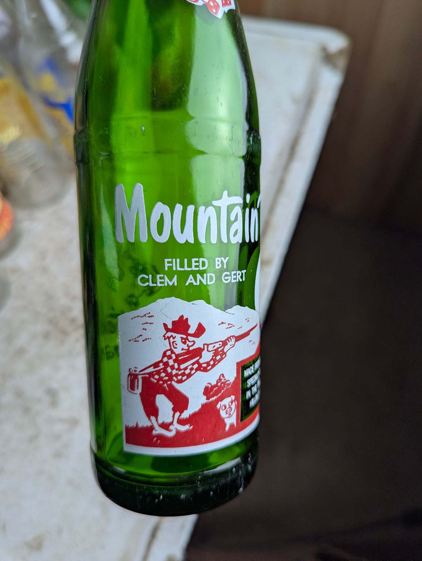 Vintage Mountain Dew 10oz Hillbilly 'Filled by Clem and Gert'  Green Glass ACL Soda Bottle
