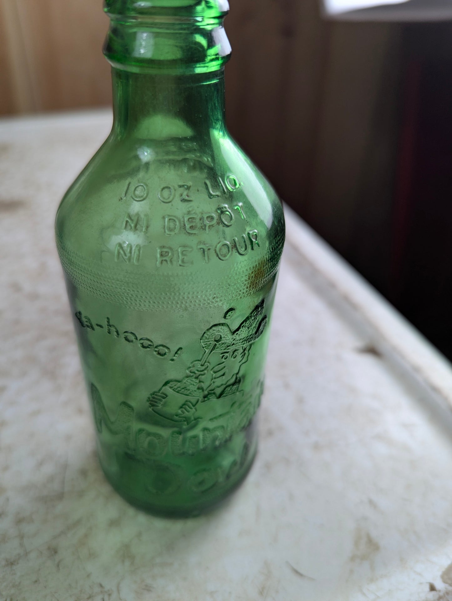 1960s Mountain Dew Hillbilly Stubby Green Embossed Glass Soda Bottle