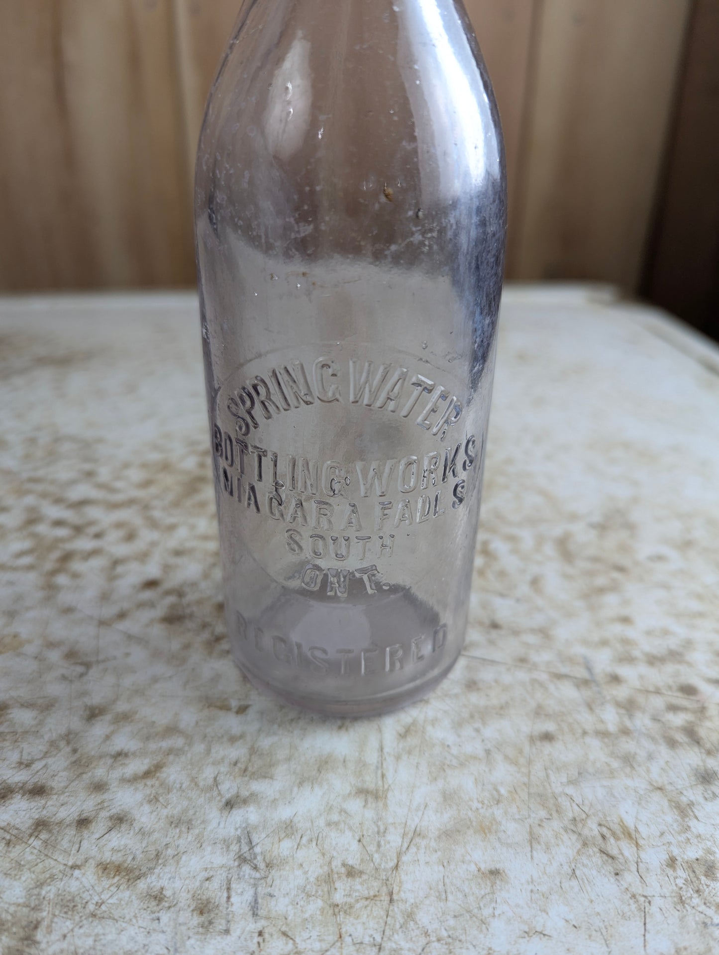 Niagra Falls Bottling Works Antique Embossed Amethyst Maganese Glass Soda Bottle