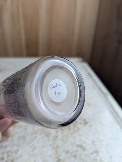 Niagra Falls Bottling Works Antique Embossed Amethyst Maganese Glass Soda Bottle