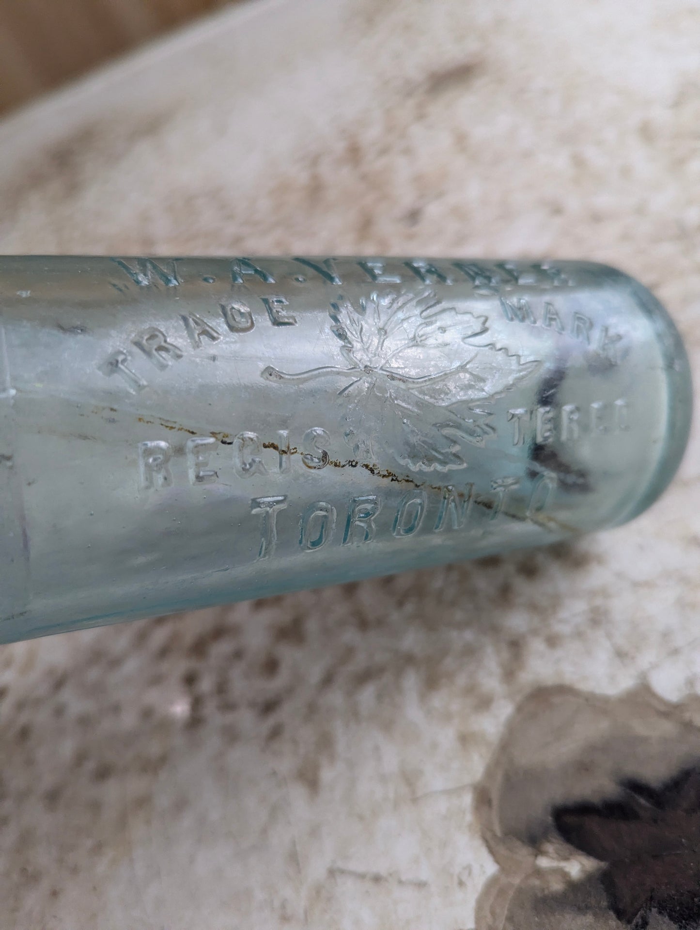 W.A. Verner Toronto Maple Leaf Embossed Aqua Glass Hutchinson Soda Bottle