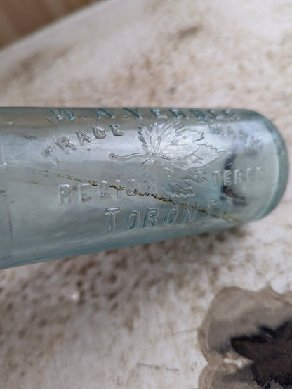 W.A. Verner Toronto Maple Leaf Embossed Aqua Glass Hutchinson Soda Bottle