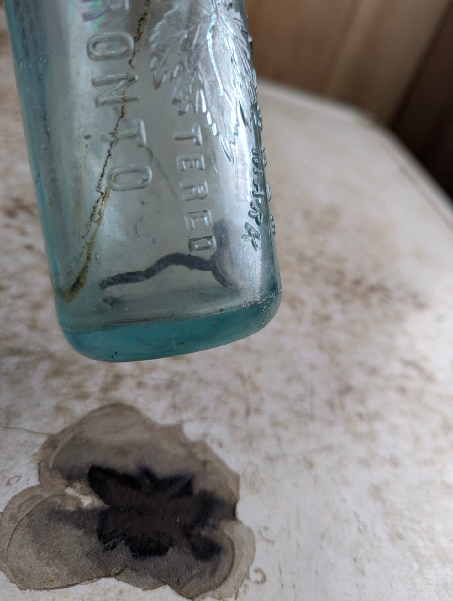 W.A. Verner Toronto Maple Leaf Embossed Aqua Glass Hutchinson Soda Bottle
