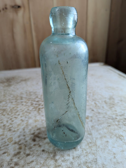 W.A. Verner Toronto Maple Leaf Embossed Aqua Glass Hutchinson Soda Bottle