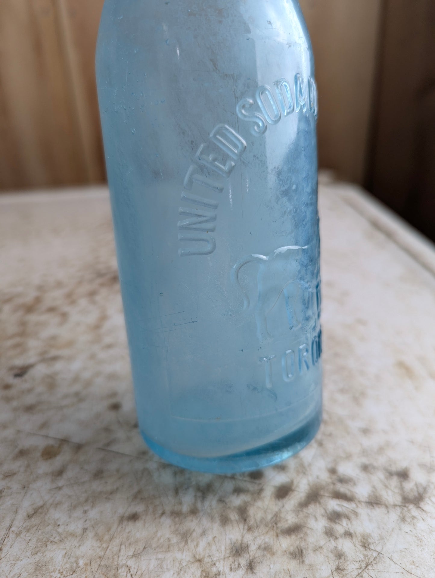United Soda Water Mfc Co Toronto Antique Lion Embossed Aqua Blue Glass Soda Bottle