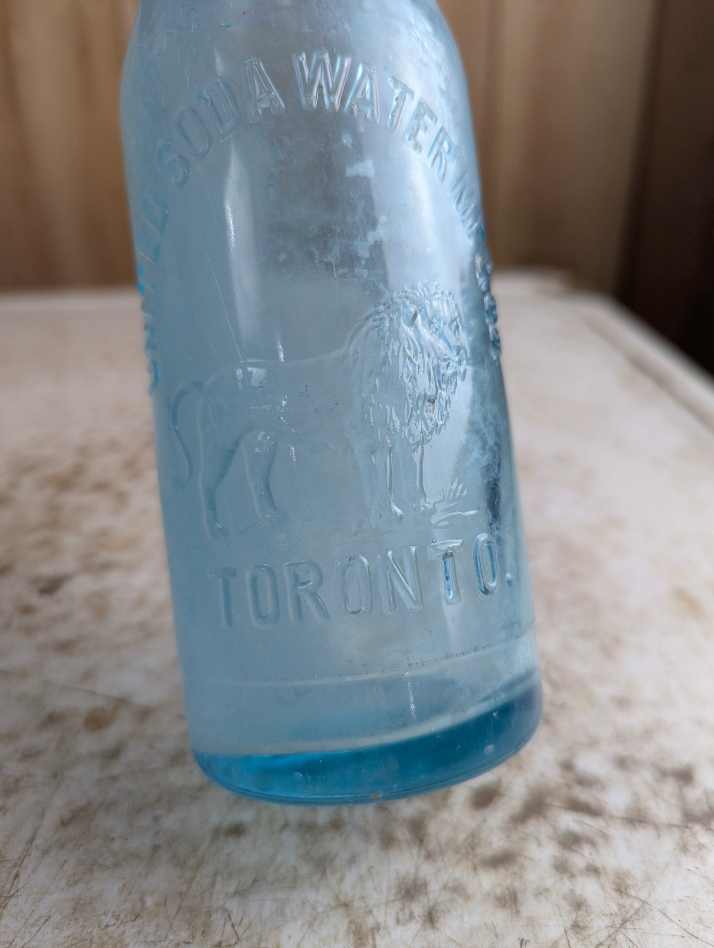 United Soda Water Mfc Co Toronto Antique Lion Embossed Aqua Blue Glass Soda Bottle