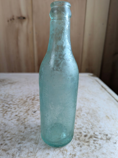 L.A. Kirkland Toronto Antique Embossed Aqua Blue Glass Soda Bottle