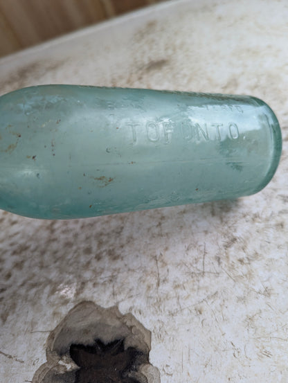 L.A. Kirkland Toronto Antique Embossed Aqua Blue Glass Soda Bottle
